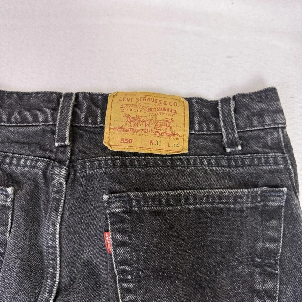 Vintage Levi's 550 Black Jeans‎ 31x34 Made in USA Relaxed Fit Raw Hem Cut Off